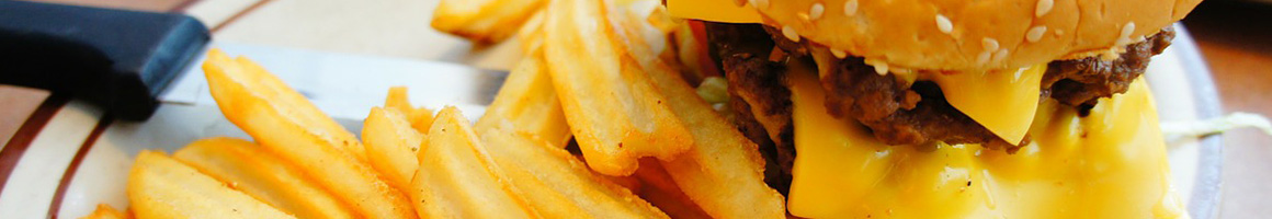 Eating Burger Greek at Lucky Greek restaurant in Corona, CA.